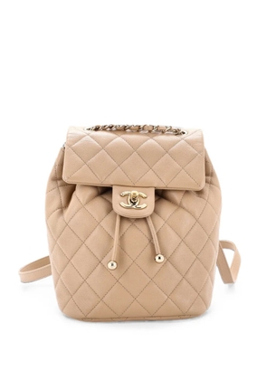 CHANEL Pre-Owned Urban Spirit NM Quilted Caviar Mini backpack - Neutrals