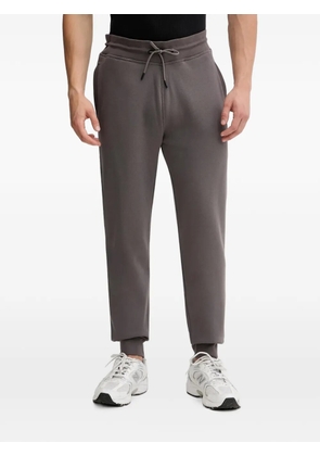GUESS USA logo-patch drawstring track pants - Grey