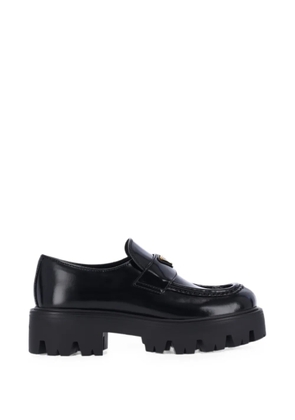Prada logo-plaque chunky-sole loafers - Black