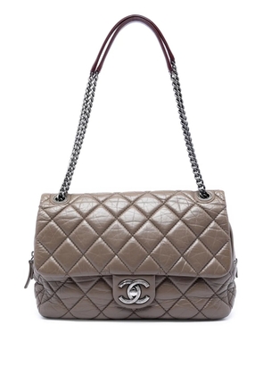 CHANEL Pre-Owned 2013-2014 Jumbo Quilted Aged Calfskin New Portobello Flap shoulder bag - Brown