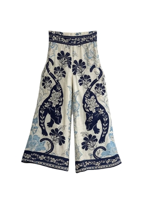 PAHIESA FORMENTERA cheetah-print flared trousers - Neutrals