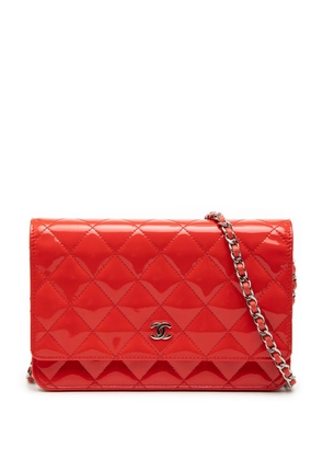 CHANEL Pre-Owned 2013-2014 CC Patent Wallet on Chain crossbody bag - Orange