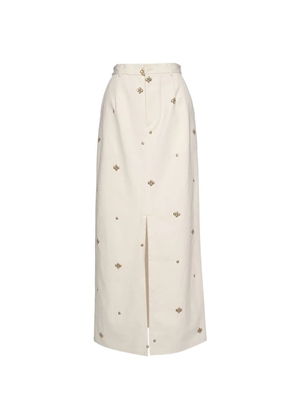 Muller Of Yoshiokubo stud-embellished front-slit maxi skirt - Neutrals