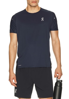 On Performance-T in Navy & Black - Navy. Size XXL/2X (also in XS, S, M, L, XL/1X).