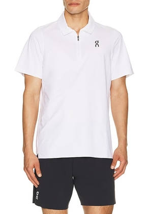 On Court Polo in White - White. Size XL/1X (also in XS, S, M, L, XXL/2X).