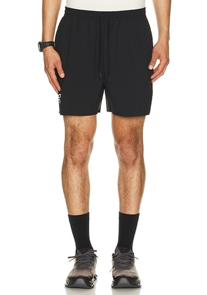 On 5 Court Shorts in Black - Black. Size XS (also in S, M, L, XL/1X, XXL/2X).