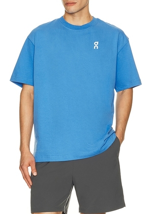 On Club T in Jay - Blue. Size XL/1X (also in XS, S, M, L, XXL/2X).