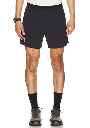 On 5 Performance Shorts in Black - Black. Size XS (also in S, M, L, XL/1X, XXL/2X).