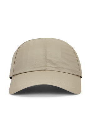 On On Cap in Brume - Tan. Size all.