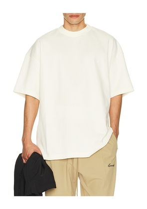Fear of God ESSENTIALS Signature 90's Short Sleeve Tee in White. Size XS. Also in S, M, L, XL/1X, XXL/2X, XXXL/3X.