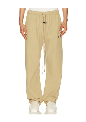 Fear of God ESSENTIALS Signature Track Pant in Grey. Size XS. Also in S, M, L, XL/1X, XXL/2X, XXXL/3X.