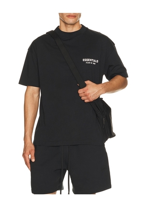 Fear of God ESSENTIALS Classic Fit T-shirt Back Logo in Black. Size S. Also in XS, M, L, XL/1X, XXL/2X.