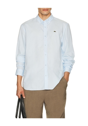 Lacoste Regular Fit Stretch Poplin Shirt in Light Blue in Blue. Size 40. Also in 42, 38, 44, 46.