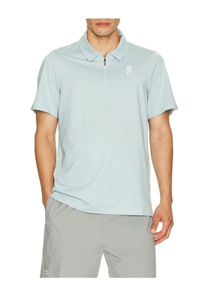 On Court Polo in Blue. Size XS. Also in S, M, L, XL/1X, XXL/2X.