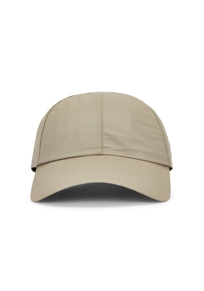 On On Cap in Tan.