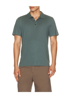 Theory Bron Polo in Teal. Size M. Also in S, L, XL/1X, XXL/2X.