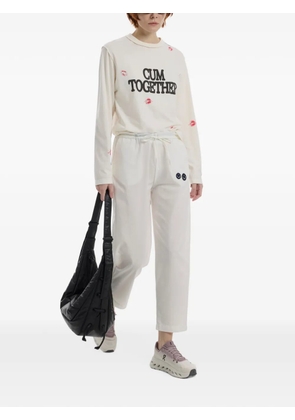 Joshua Sanders Smiley patch track pants - Neutrals