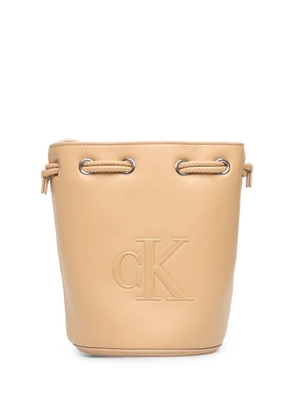 Calvin Klein logo-embossed drawstring bucket bag - Neutrals