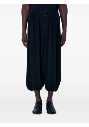 Yohji Yamamoto pleated drop-crotch trousers - Black