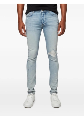 AMIRI distressed slim-fit jeans - Blue