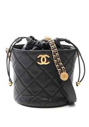 CHANEL Pre-Owned 2021-2026 Quilted Caviar Twist Your Buttons bucket bag - Black