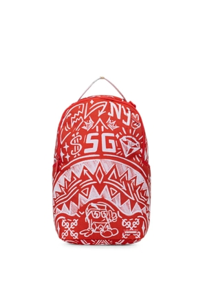 Sprayground graffiti-print Shark backpack - Red