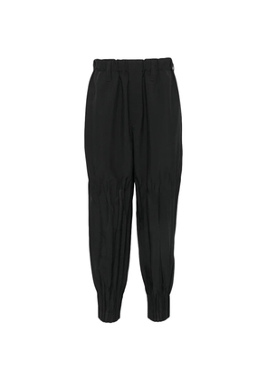 Issey Miyake Men pleated-cuff elasticated-waist trousers - Black