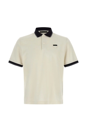 Prada triangle-patch piqué polo shirt - White