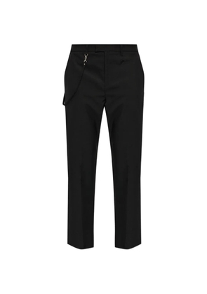 Courrèges logo-embroidered tailored trousers - Black