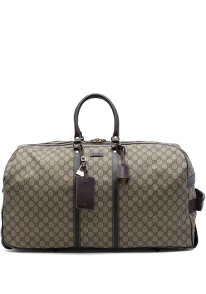 Gucci Pre-Owned 2016-2026 Large GG Supreme Trolley travel bag - Neutrals