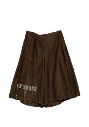 Yohji Yamamoto slogan-embroidered skorts - Brown