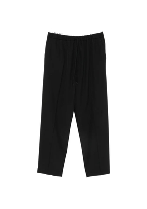 MM6 Maison Margiela drawstring-waist logo-patch trousers - Black