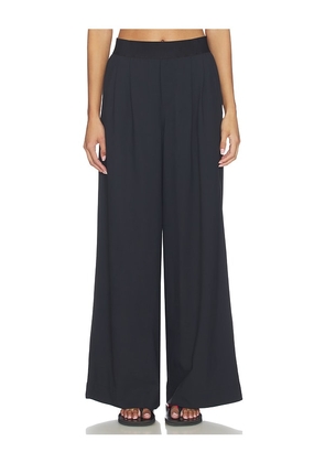Beyond Yoga Exposed Elastic Trousers in Black. Size S. Also in XXS, XS, M, L, XL.