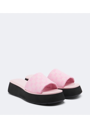 Gucci GG canvas platform slides