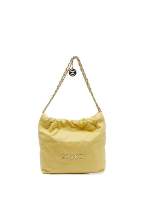CHANEL Pre-Owned Chanel 22 quilted bucket bag - Yellow