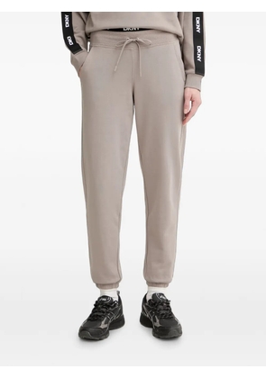 DKNY high-rise logo-waistband track pants - Brown