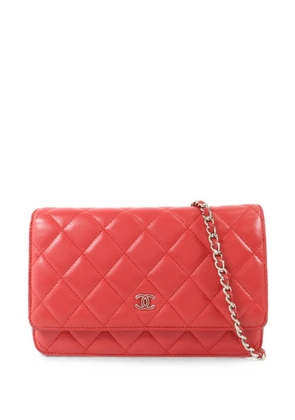 CHANEL Pre-Owned quilted Wallet On Chain shoulder bag - Red