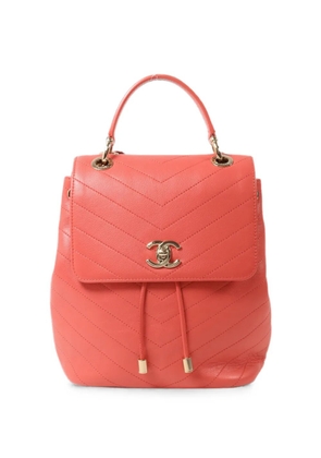 CHANEL Pre-Owned CC turn-lock chevron backpack - Pink