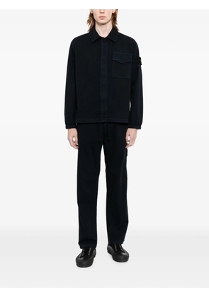 Stone Island logo-patch straight-leg trousers - Black