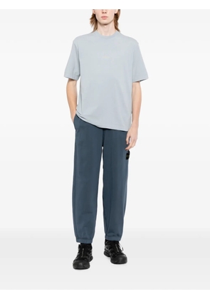 Stone Island logo-patch track pants - Blue