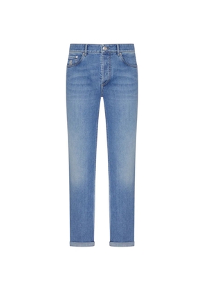 Brunello Cucinelli faded-effect logo-embroidered jeans - Blue