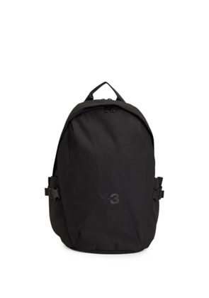 Y-3 buckle-detail logo-print backpack - Black