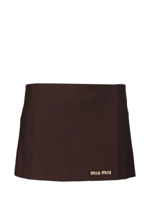 Miu Miu logo-patch wrap mini skirt - Brown