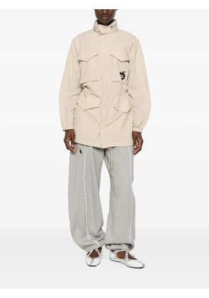 Kenzo Kenzo Sounds logo-print parka coat - Neutrals