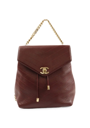 CHANEL Pre-Owned CC chevron-quilted backpack - Red