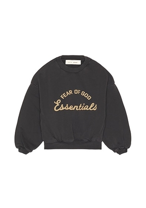 Fear of God ESSENTIALS Kids Training 90's Crewneck Sweatshirt in Faded Black - Black. Size 6/7 (also in 2/3, 4/5).