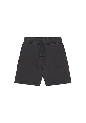 Fear of God ESSENTIALS Kids Signature Classic Short in Faded Black - Black. Size 2/3 (also in 4/5, 6/7).