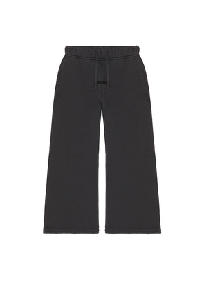 Fear of God ESSENTIALS Kids Signature Flare Sweatpant in Black. Size 2/3. Also in 4/5, 6/7.