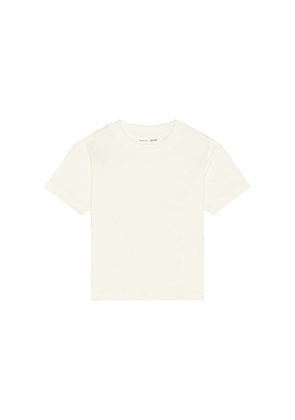 Fear of God ESSENTIALS Kids Signature Classic Short Sleeve Tee in Ivory. Size 2/3. Also in 4/5, 6/7.