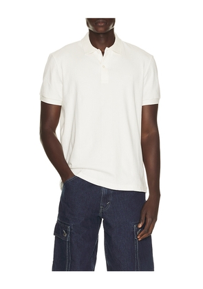 Lacoste Polo in Nude. Size 3. Also in 4, 5, 6, 7.